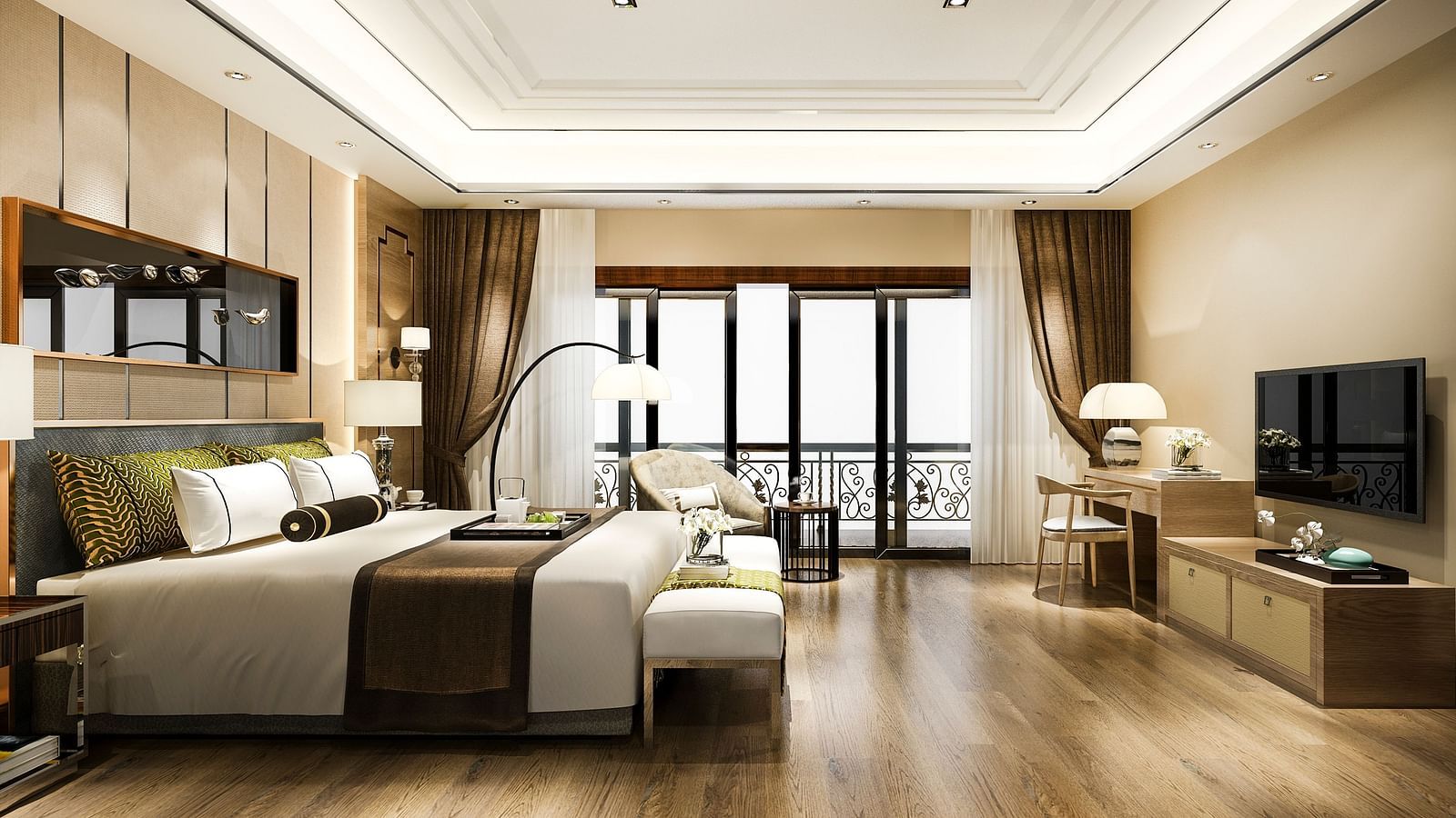 A side of bed in a suite with a huge glass window, working table, and TV