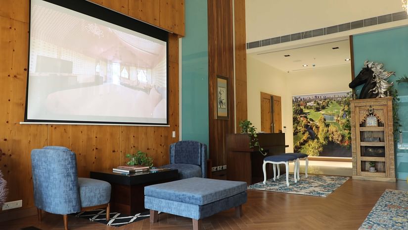 tables under a projector screen