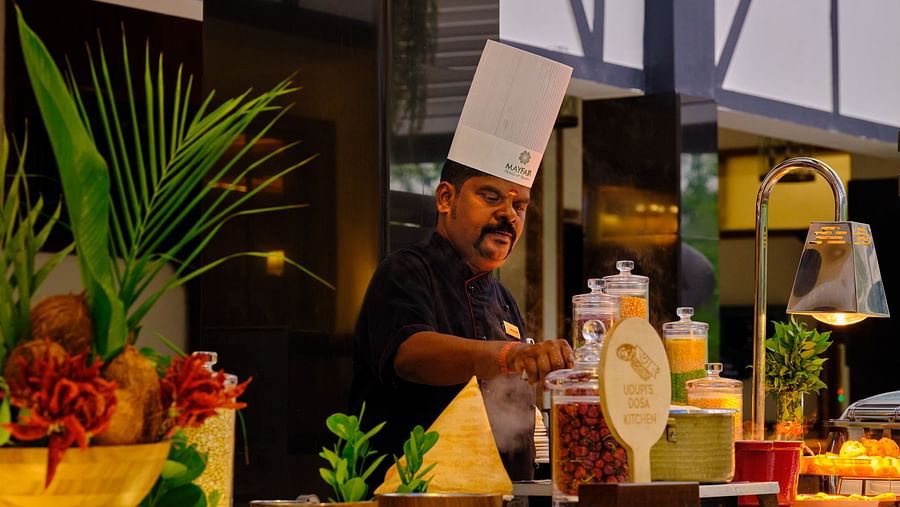 chefs working at the live counter at tea pot - Mayfair Tea Resort, Siliguri