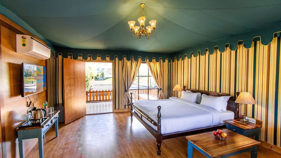 a king size bed of one of the tents in Ranthambore at The Baagh Ananta Elite 2