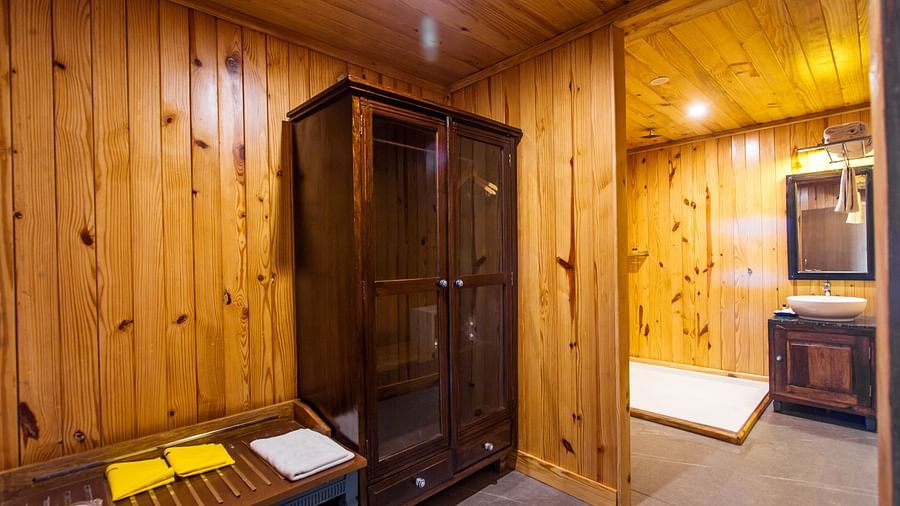 a wardrobe kept outside the washroom of one of the luxury tents in Ranthamborea king size bed of one of the tents in Ranthambore at The Baagh Ananta Elite