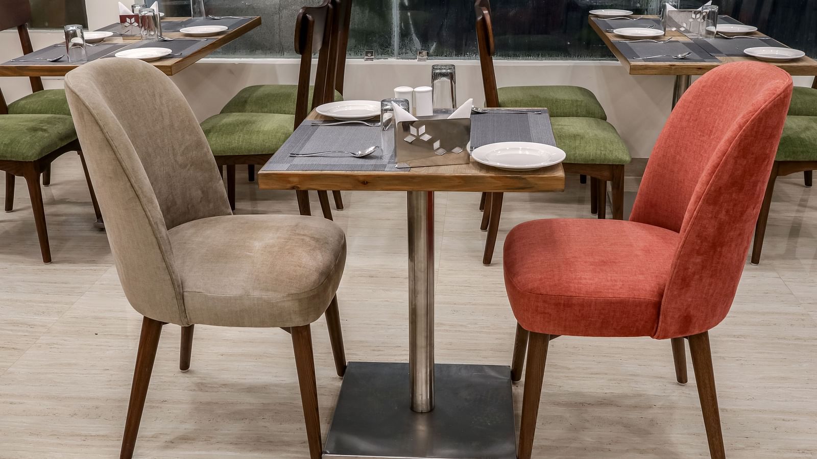 Close up shot of seating arrangement inside the Restaurant - Starlit Suites Newtown, Kolkata