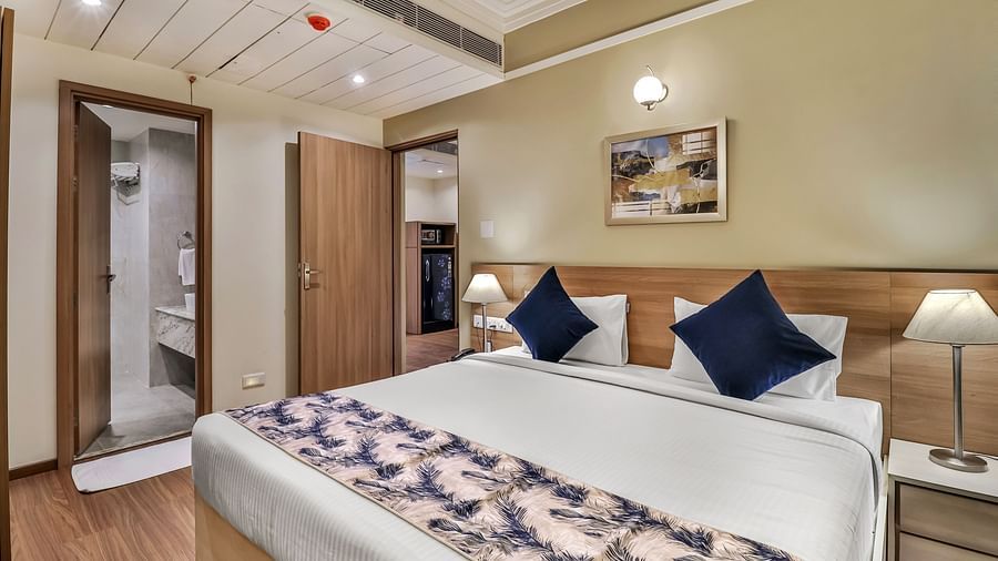 a double bed inside Deluxe One Bedroom Suite 3 - Starlit Suites Newtown, Kolkata
