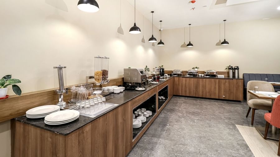 Overview of the buffer section inside Gourmet - Starlit Suites Newtown, Kolkata
