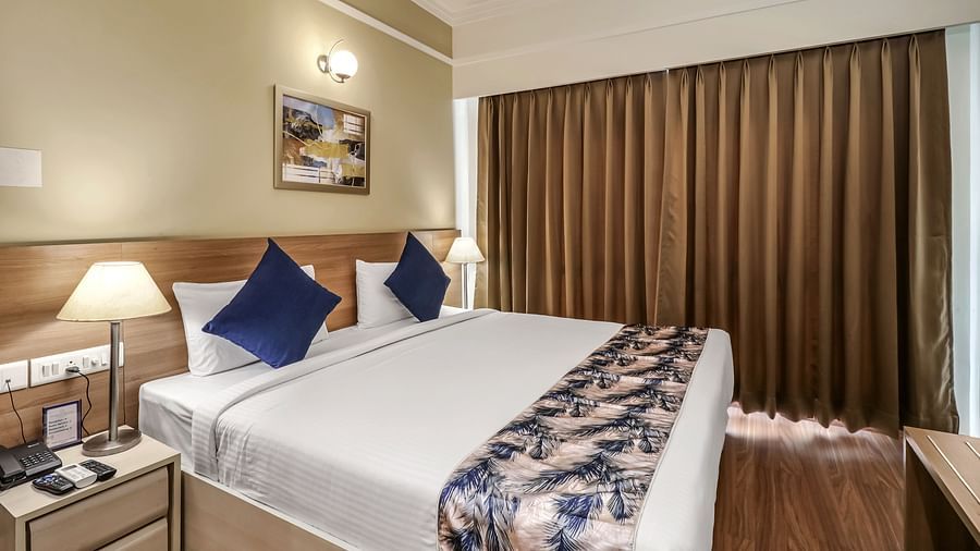 a double bed inside Premium Studio - Starlit Suites Newtown, Kolkata
