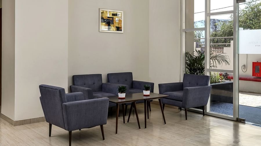 Side view of the sofas inside the Lobby - Starlit Suites Newtown, Kolkata
