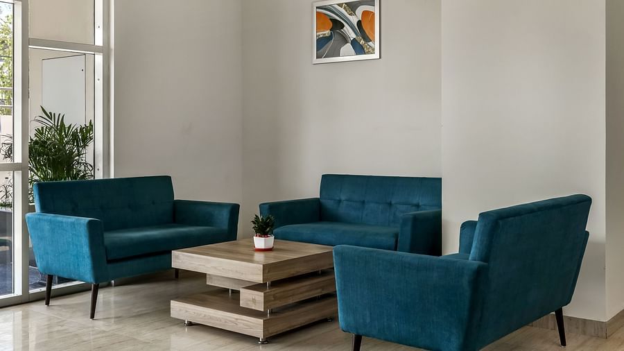 Sofas and a coffee table inside Lobby - Starlit Suites Newtown, Kolkata