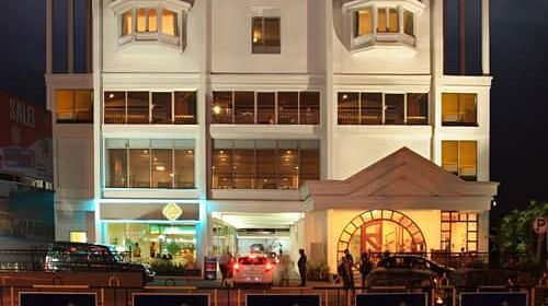 Facade View of Abad Plaza hotel on MG Road, Ernakulam