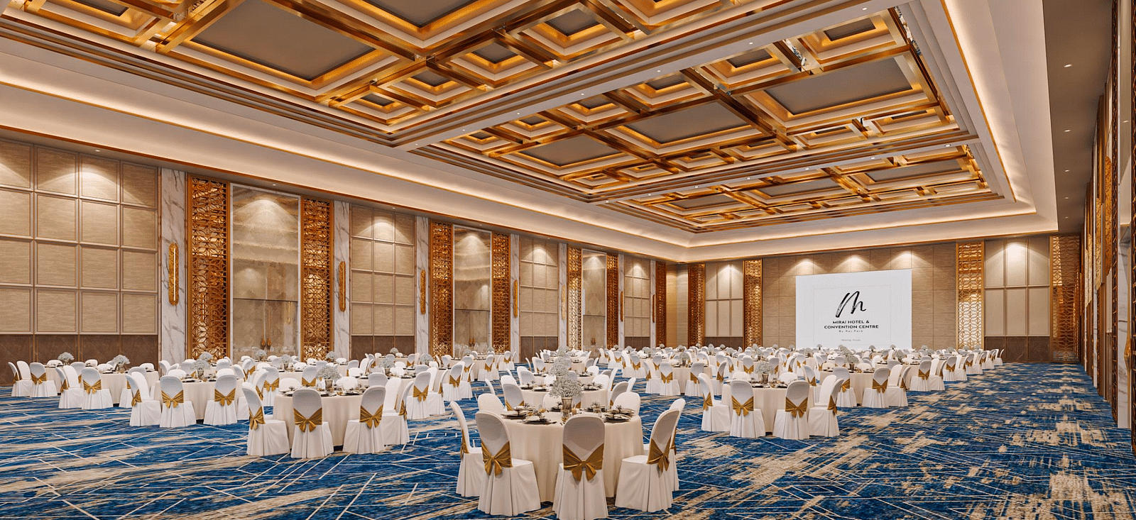 A wider view of a banquet seating with carpet, modern interior and projector upfront
