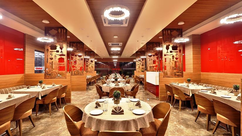 Seating arrangements inside the Restaurant with modern interiors - VITS Devbhumi, Dwarka