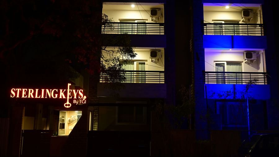 Facade of Sterling Keys by TGI at night in Bangalore