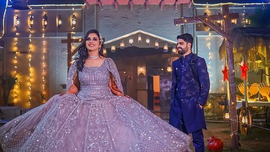 a bride and groom dancing and posing for a pre-wedding shoot at Themis Mudhouse Resorts