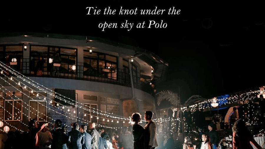 Polo Orchid Resort Cherrapunjee wedding poster showing a poolside ceremony at night with fairy lights, guests and a couple posing on the pool deck.