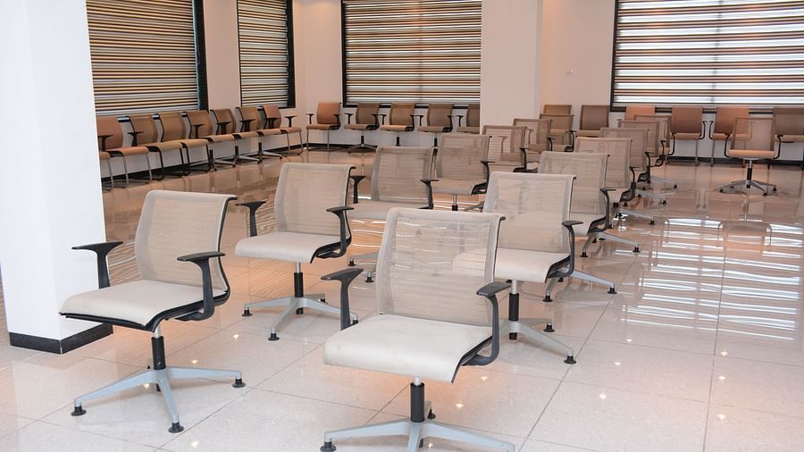 Pride Ranakpur Resort Convention Centre - interior view of the Senate hall containing numerous office chairs placed in two columns and along the walls of the room