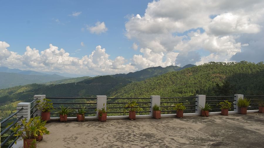Spacious rooftop terrace with panoramic views of the mountains and surrounding landscape.