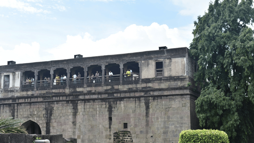 Stone fortifications and upper galleries of Shaniwar Wada in Pune.