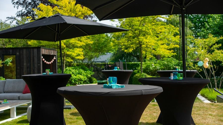 an image of outdoor event space with seating arrangements.