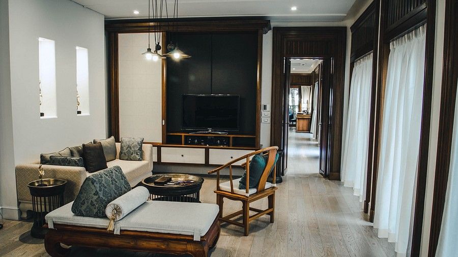 image featuring a common family seating area facing towards the television - two bedroom private pool beachfront villa