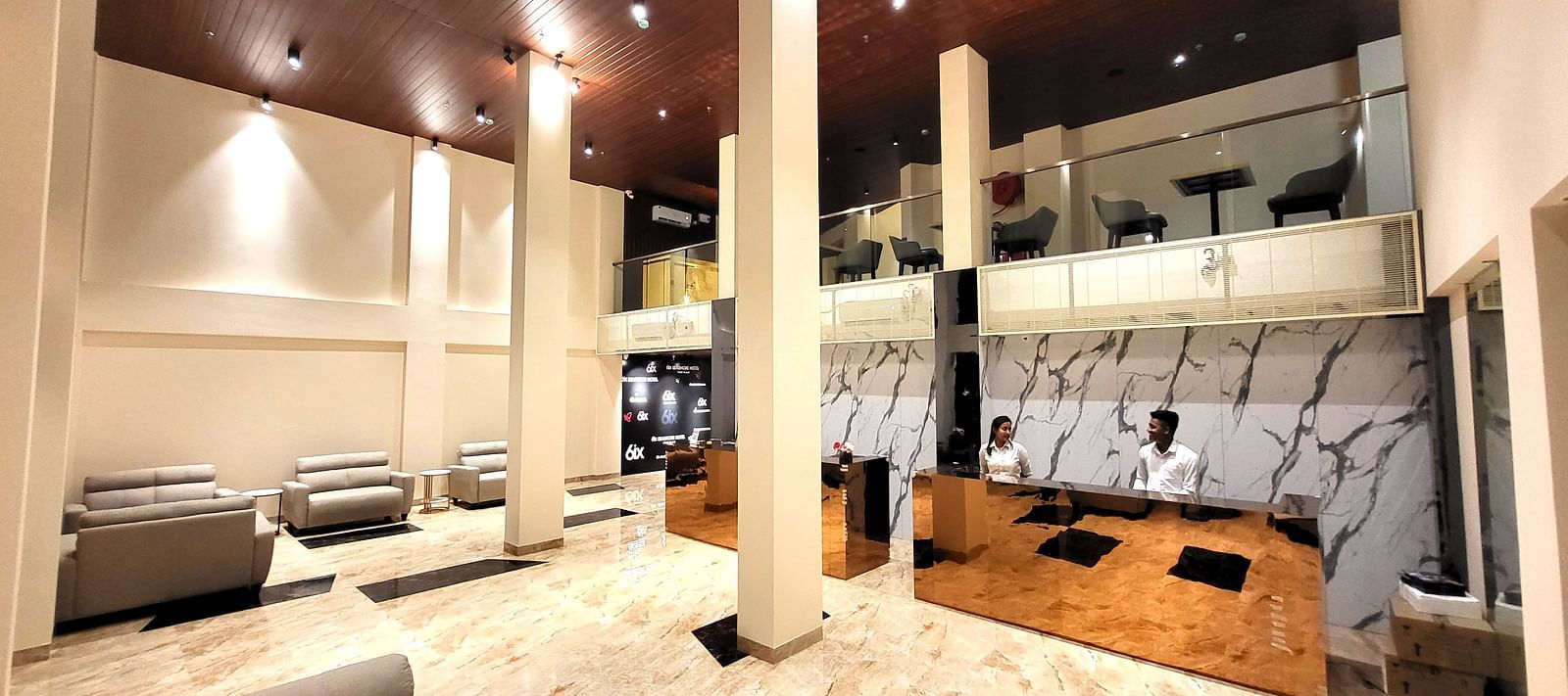 Wide view of the Lobby and the reception at 6ix Seashore Hotel, Port Blair
