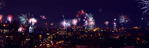 fireworks against a night city skyline
