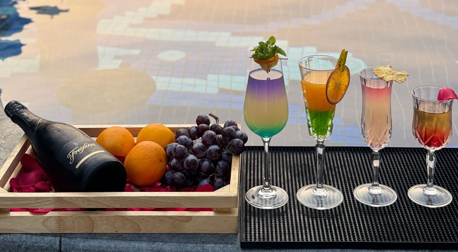A trio of sophisticated cocktails with stylish garnishes - Kaldan Samudra Palace