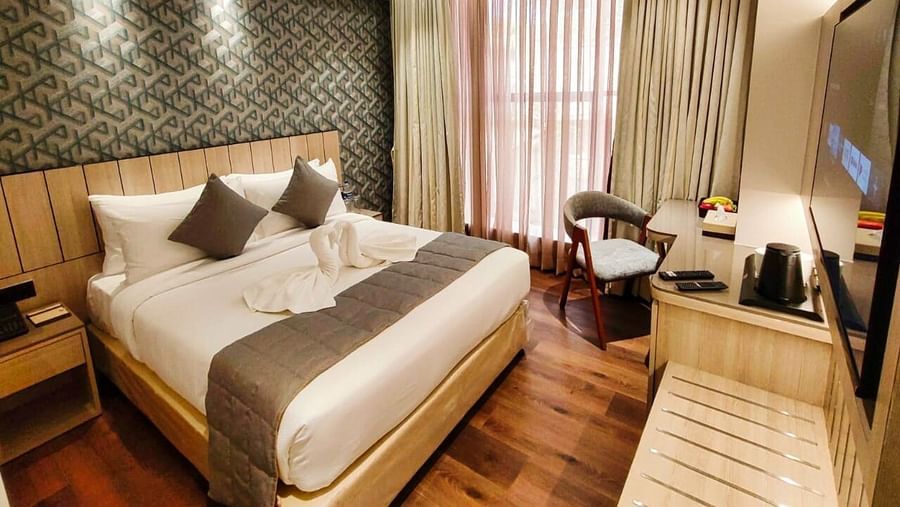 Side view of hotel room with modern amenities at Maxxvalue Hotel MIDC,  Mumbai