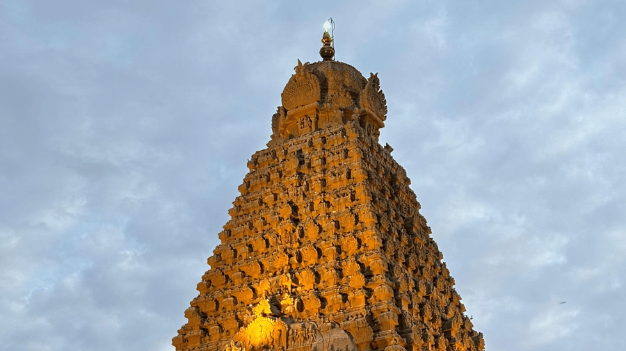 A view of the main temple tower, or vimana, of the Brihadeeswarar Temple in Thanjavur, India. A must-visit on your trip from Chennai to Thanjavur.