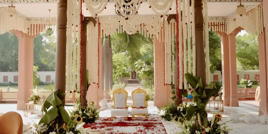 Floral mandap decor with pillars at Umaid Palace set for Charvi & Dhruv wedding ceremony.
