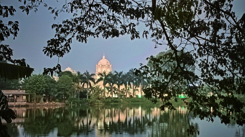 a monument behind a lake