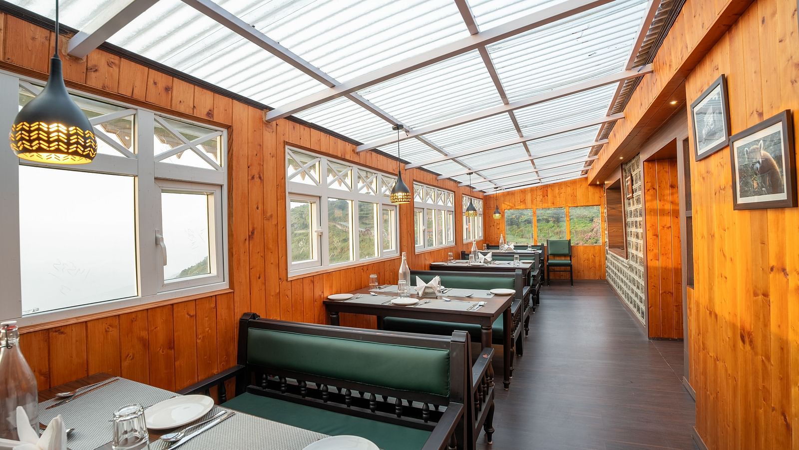 Seating arrangement in the restaurant at Poshtel, Meghma