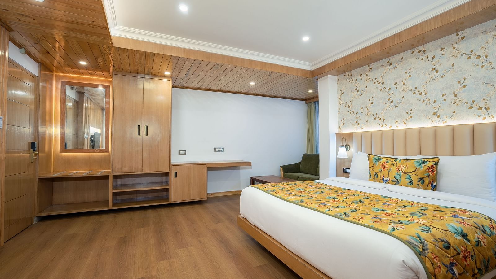 view of a king size bed of a Premium Room at Summit Grand Resort & Spa