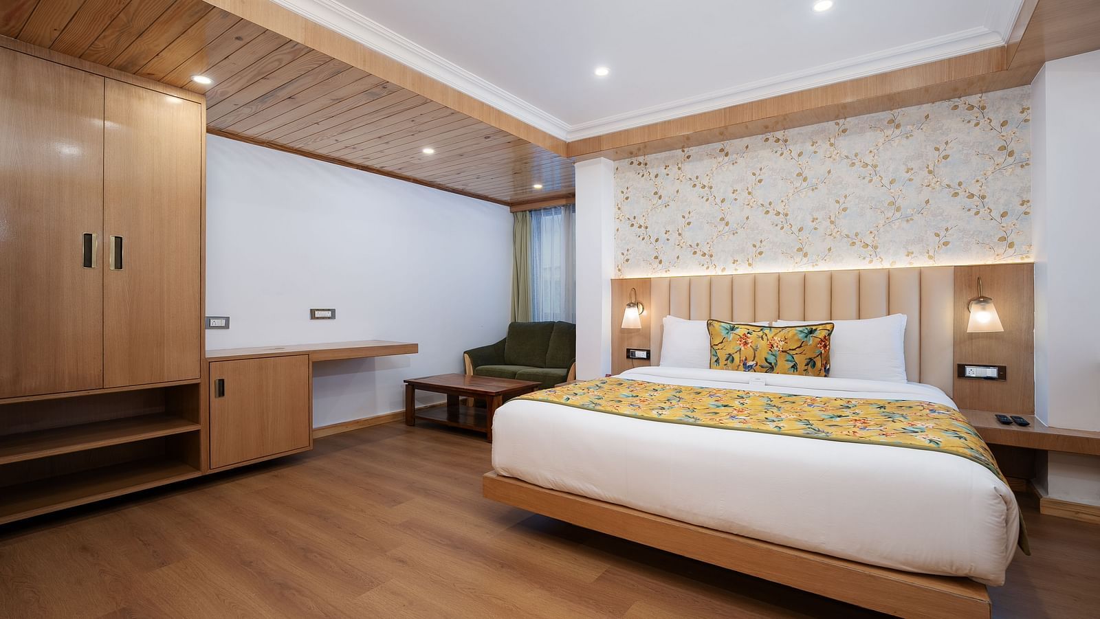 view of a king size bed of a Premium Room at Summit Grand Resort & Spa