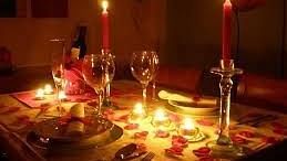 A close up shot of a candlelight dinner arrangement - polo floatel kolkata