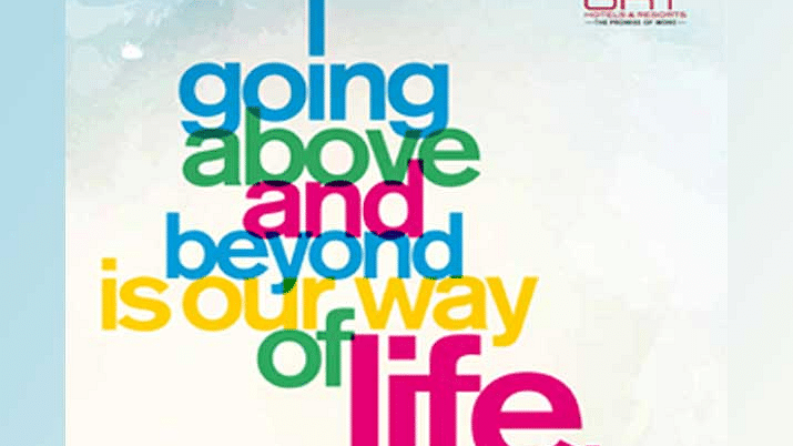 A vibrant promotional graphic with the text-Going above and beyond is our way of life-in bold, colourful typography.