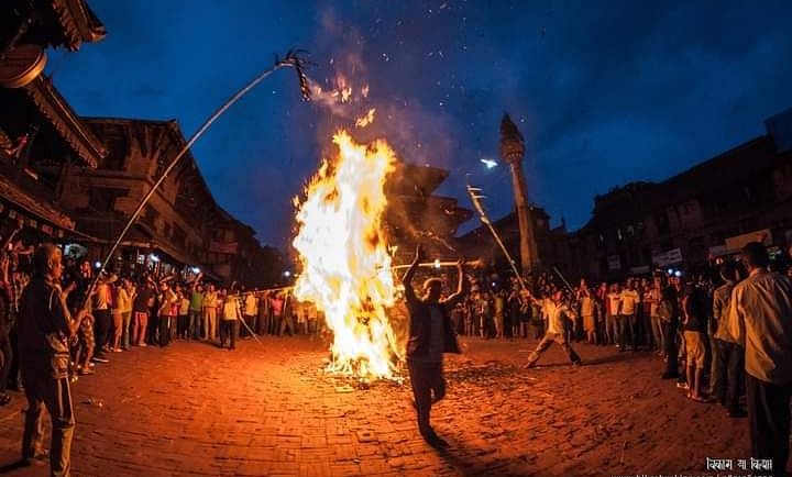 Three-legged effigy burning during the Gatha Muga Charhe festival