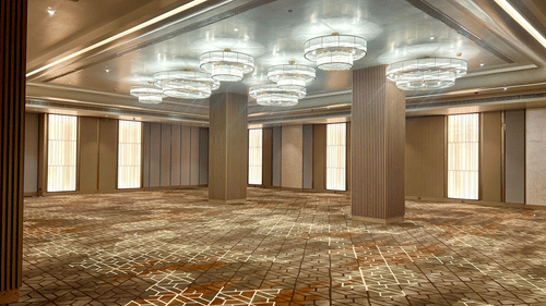 A grand banquet hall with high ceilings featuring chandeliers - Serene Sarovar Premiere Hargeisa