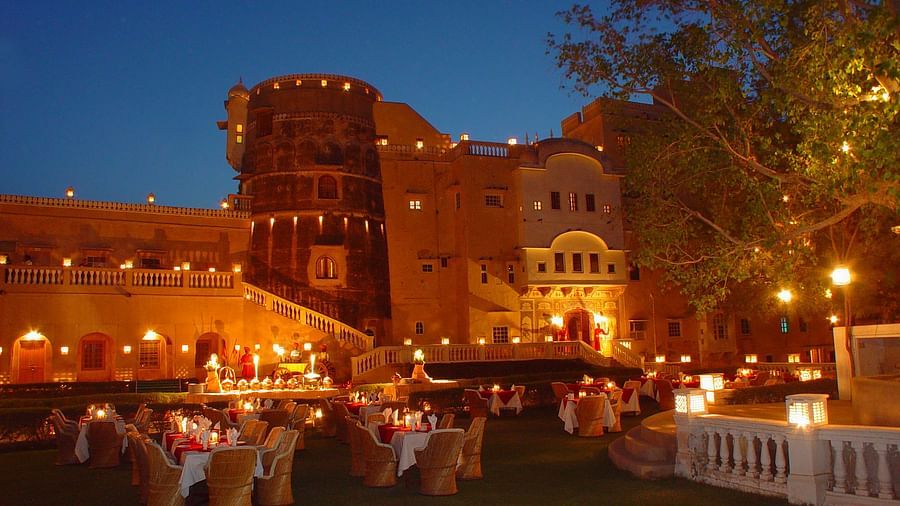 Gala Dinner at Gulab Bagh during evening with a cluster style arrangement  - Hotel Castle Mandawar, Jhunjunu