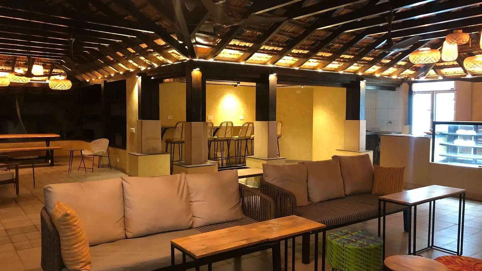 A communal space with seating area at Indie Stays Resort, Goa