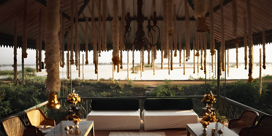 Decorated mandap setup under canopy at Umaid Palace prepared for Charvi & Dhruv wedding rituals