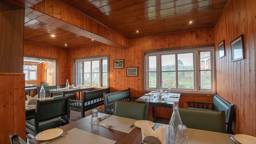 Seating arrangement in the restaurant at Poshtel, Meghma