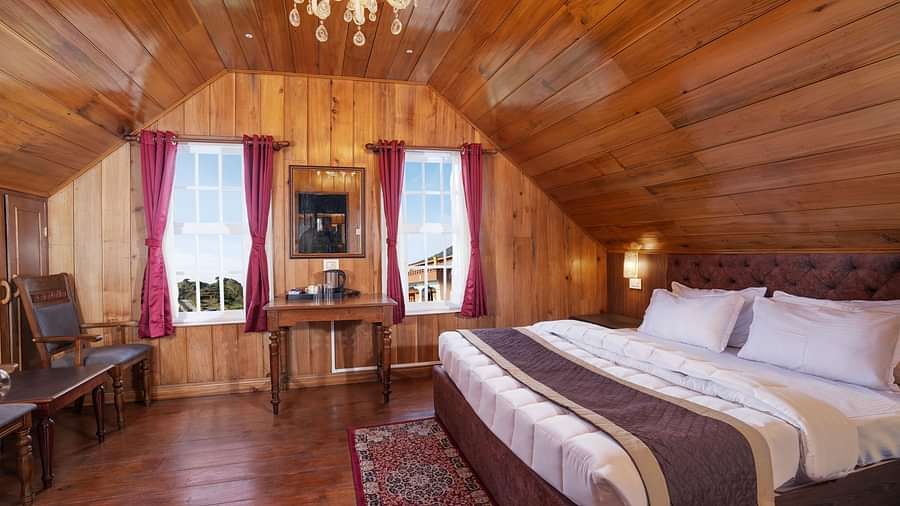 A room at Poshtel, Meghma with a double bed