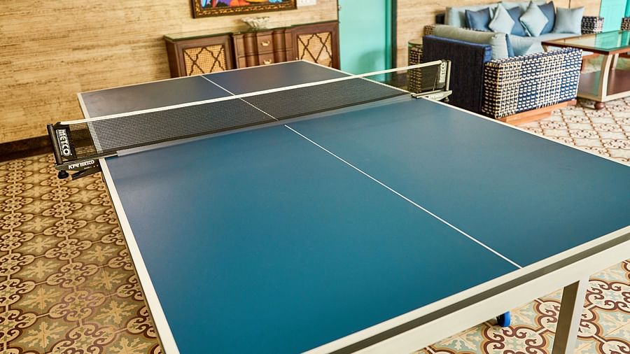 The table tennis table is neatly arranged at Mayfair Manor, Alibag