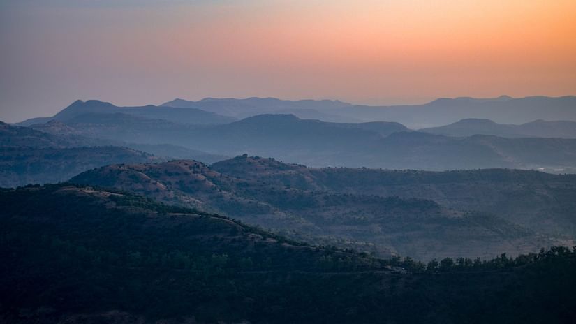 sunrise amidst mountains 