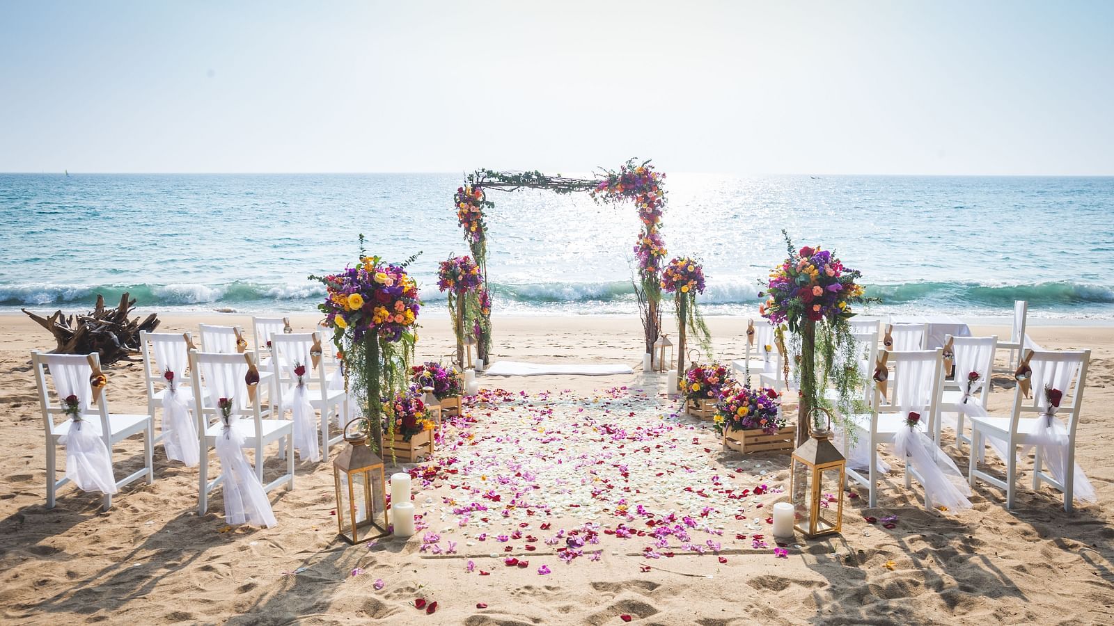 The beach side wedding setup at maikhao dream villa resort & spa, phuket