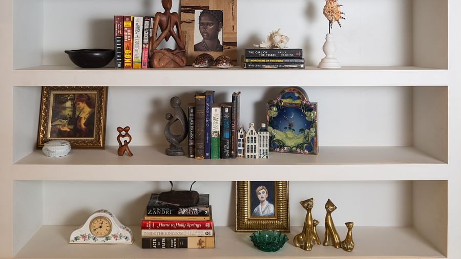 A shelf with artefacts placed on it - S Hotel Montego Bay, Jamaica