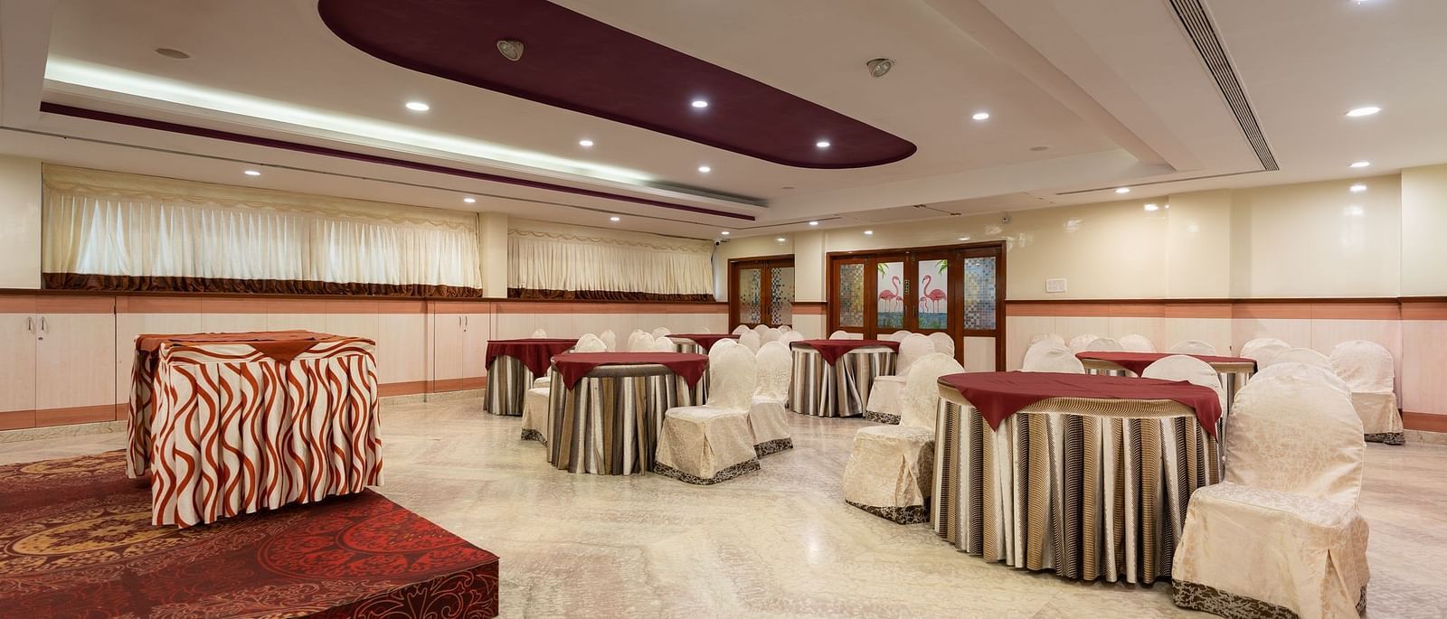 Seating arrangements inside the banquet hall - Hotel Pai Comforts, JP Nagar