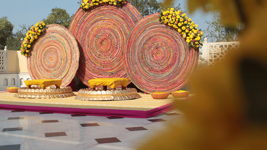 a stage set up on the terrace for the bride and groom with good decorations - heritage village resorts & spa, Manesar