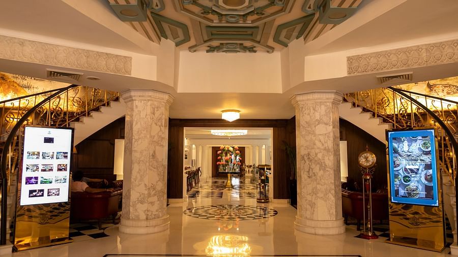 An Image of the grand lobby at The Claridges New Delhi with stairs leading to the first floor - Claridges Collection