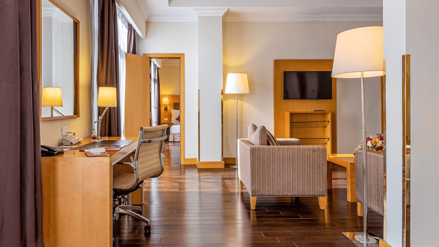 An overview of a room with the living room in view - Ramada by Wyndham Addis, Addis Ababa.