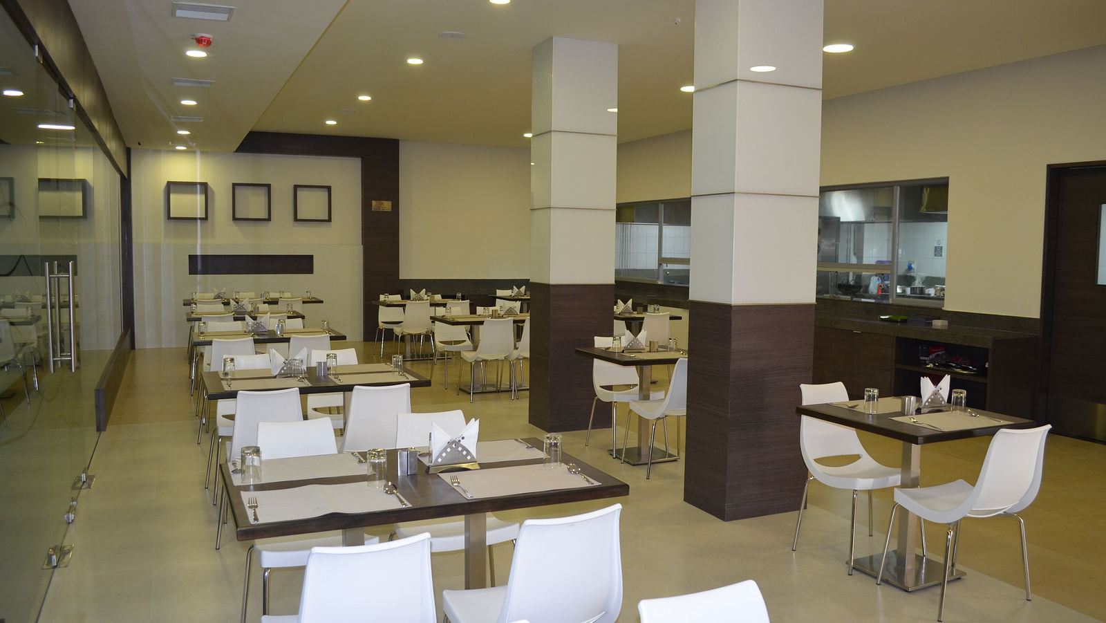 An image of a dining of a restaurant at Regency Tiruttani by GRT Hotels.